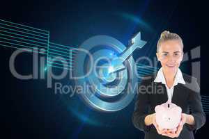 Composite image of businesswoman holding pink piggy bank