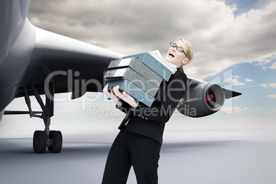 Composite image of businesswoman carrying folders