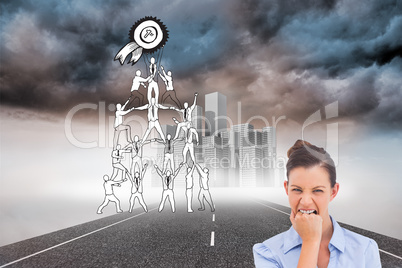 Composite image of furious businesswoman looking at the camera