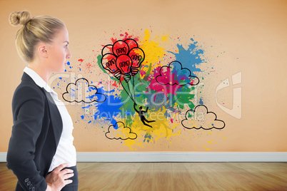Composite image of businesswoman standing with hands on hips Composite image of businesswoman standing with hands on hips
