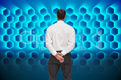 Composite image of businessman turning his back to camera