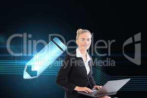 Composite image of businesswoman using laptop