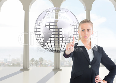 Composite image of businesswoman pointing somewhere