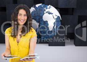 Composite image of cheerful curly haired brunette reading magazi