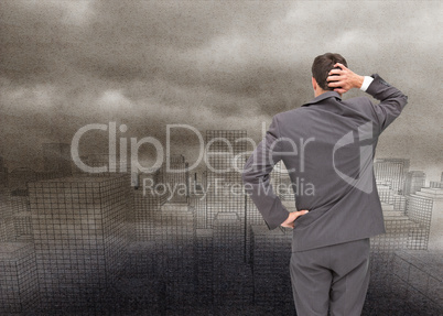 Composite image of young businessman standing back to camera scr