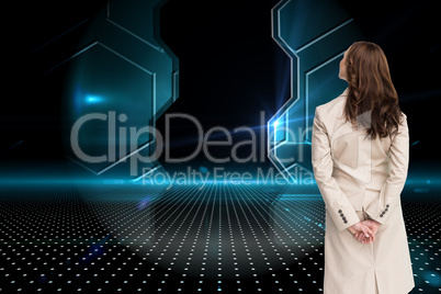 Composite image of rear view of businesswoman