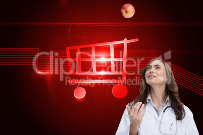 Composite image of happy doctor throwing apple