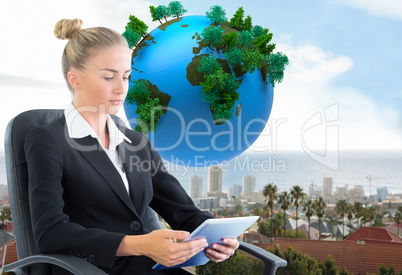 Composite image of businesswoman sitting on swivel chair with ta