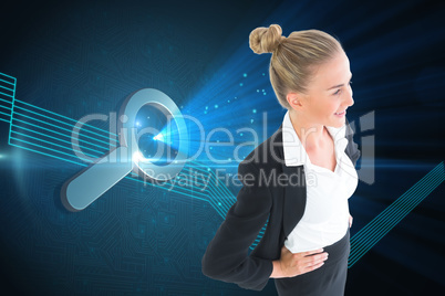 Composite image of businesswoman standing with hands on hips