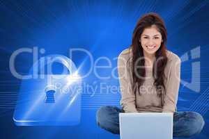 Composite image of woman sitting on the bed with the laptop in f