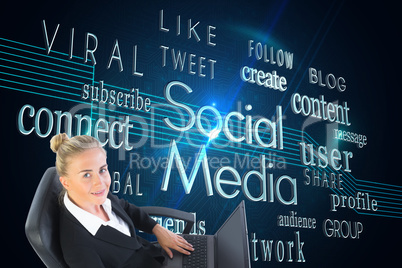 Composite image of businesswoman sitting on swivel chair with la