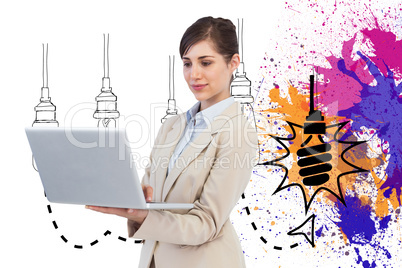 Composite image of confident businesswoman holding laptop