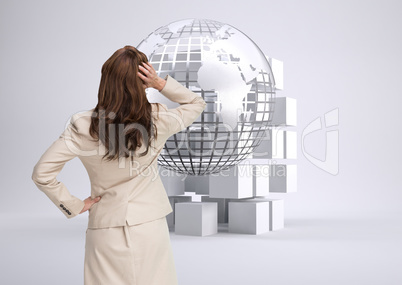 Composite image of businesswoman standing back to camera with ha