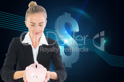 Composite image of businesswoman holding piggy bank