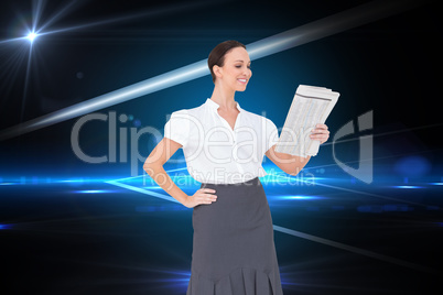 Composite image of cheerful stylish businesswoman holding newspa