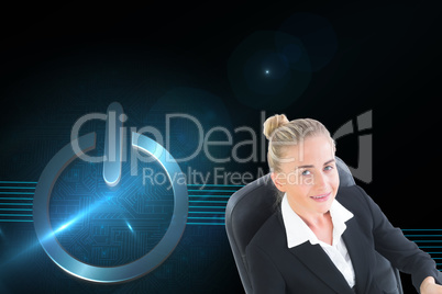 Composite image of businesswoman sitting on swivel chair with ta