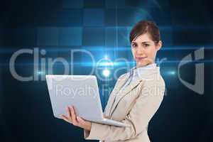 Composite image of confident young businesswoman with laptop