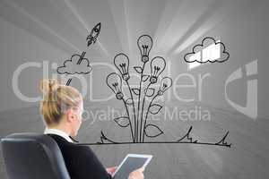Composite image of businesswoman sitting on swivel chair with ta