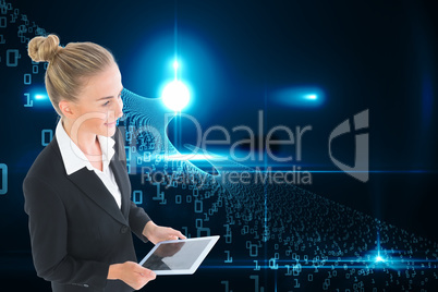 Composite image of businesswoman holding new tablet