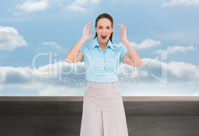 Composite image of surprised stylish businesswoman posing Composite image of surprised stylish businesswoman posing