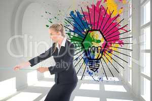 Composite image of businesswoman pulling a rope