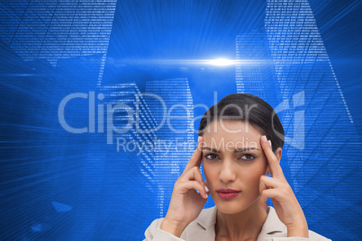 Composite image of young businesswoman putting her fingers on he