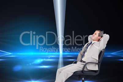 Composite image of side view of businessman leaning back in his