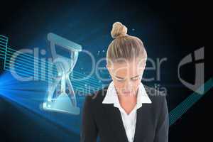 Composite image of businesswoman holding tablet