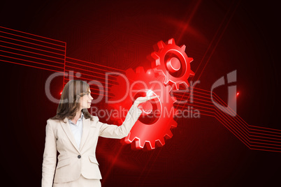 Composite image of businesswoman with empty hand open