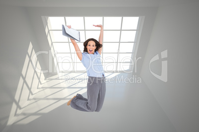 Composite image of happy classy businesswoman jumping while hold