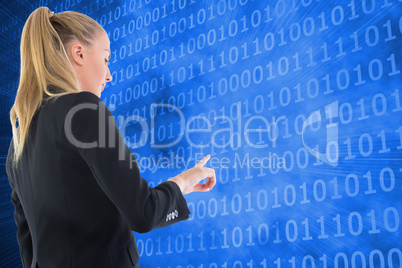 Composite image of businesswoman pointing somewhere