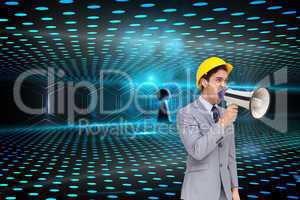 Composite image of young architect yelling with a megaphone