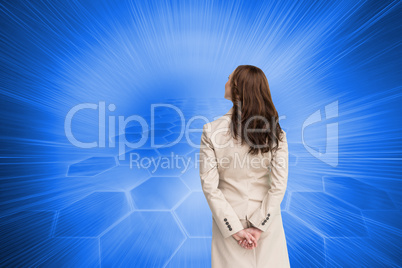 Composite image of rear view of businesswoman