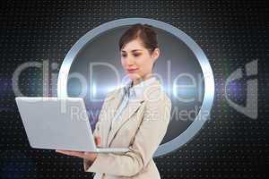 Composite image of confident businesswoman holding laptop