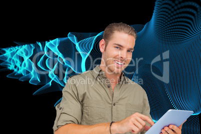 Composite image of happy man using tablet pc