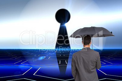 Composite image of rear view of classy businessman holding grey