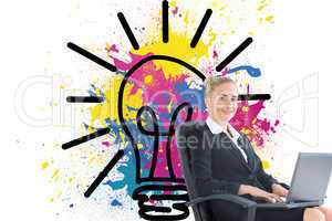 Composite image of businesswoman sitting in swivel chair with la