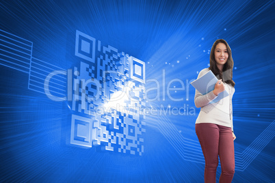 Composite image of smiling student in a computer room