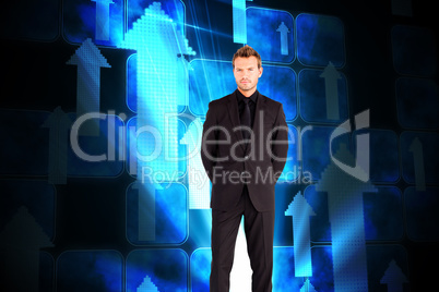 Composite image of young businessman looking at the camera