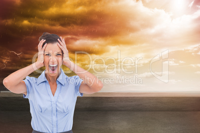 Composite image of stressed businessswoman with hand on her head