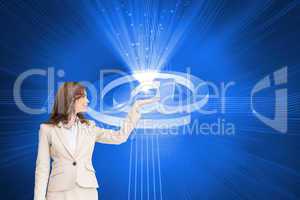 Composite image of businesswoman with empty hand open