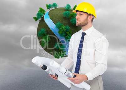 Composite image of thoughtful young architect posing