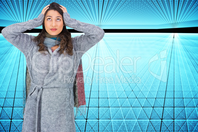 Composite image of anxious pretty brunette wearing winter clothe