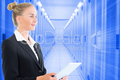 Composite image of businesswoman holding tablet