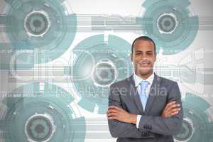 Composite image of charismatic young businessman with arms cross