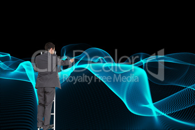 Composite image of businessman standing on ladder