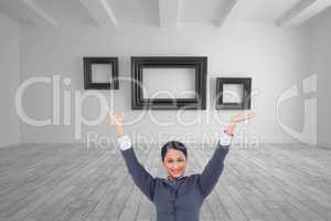 Composite image of cheering businesswoman