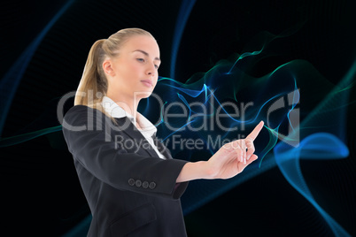 Composite image of businesswoman pointing somewhere