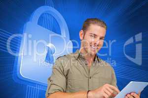 Composite image of happy man using tablet pc