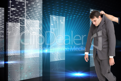 Composite image of businessman hanging